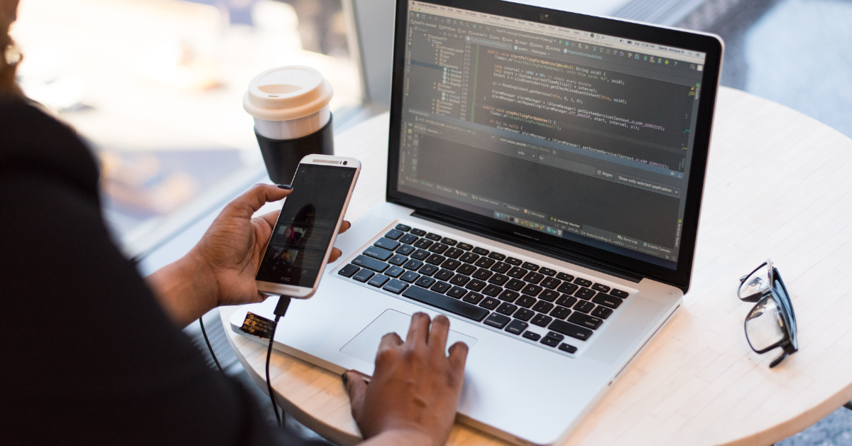 Bored developer looking at her phone