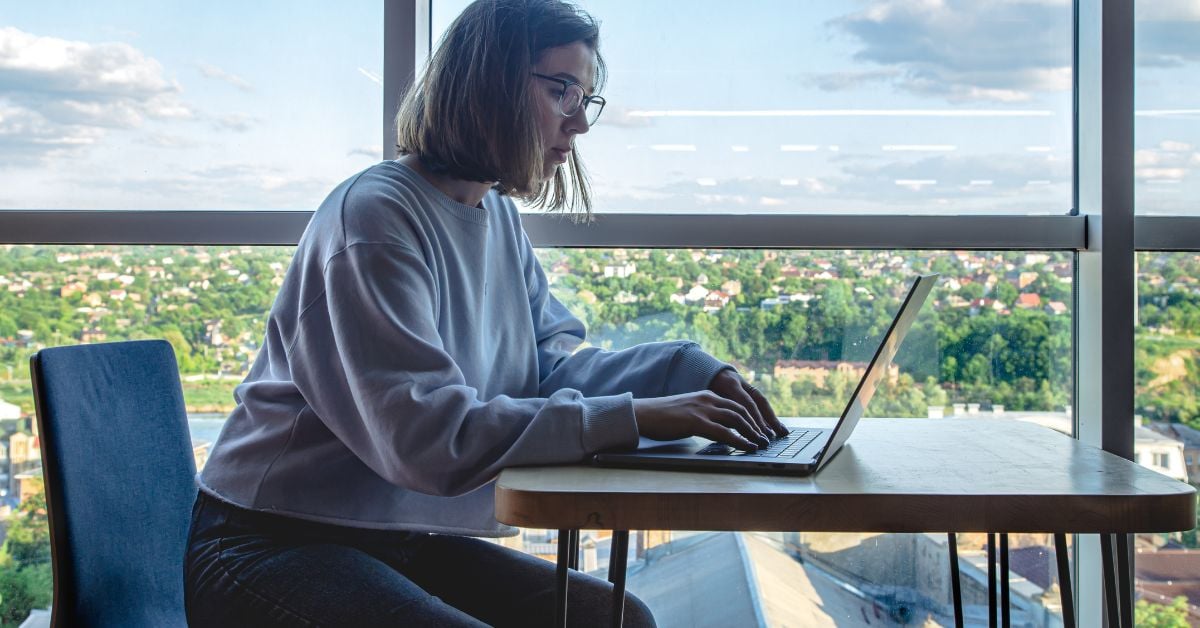 woman working remotely for a company in US